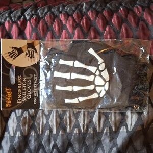 Spirit, Halloween fingerless skeleton gloves. One size fits most brand new